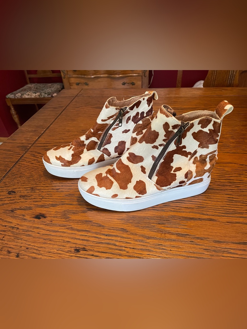 Scala Brown and White Cowprint Wedge Sneaker Booties